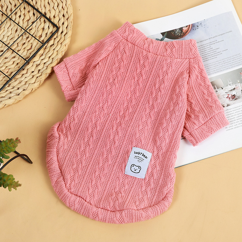 Pink bear knit pet sweater showing cable texture and short sleeves