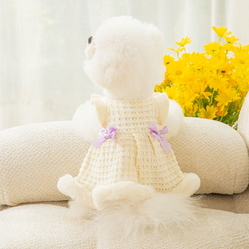 Cream bow knit pet dress shown from the back
